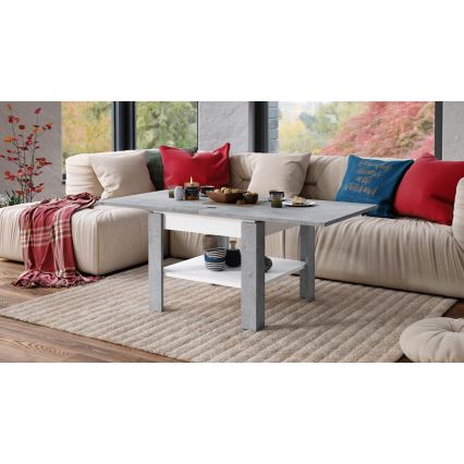 Αναδιπλούμενο τραπεζάκι σαλονιού/τραπεζαρίας με ράφι αποθήκευσης LIA σε γκρι τσιμέντο/λευκό