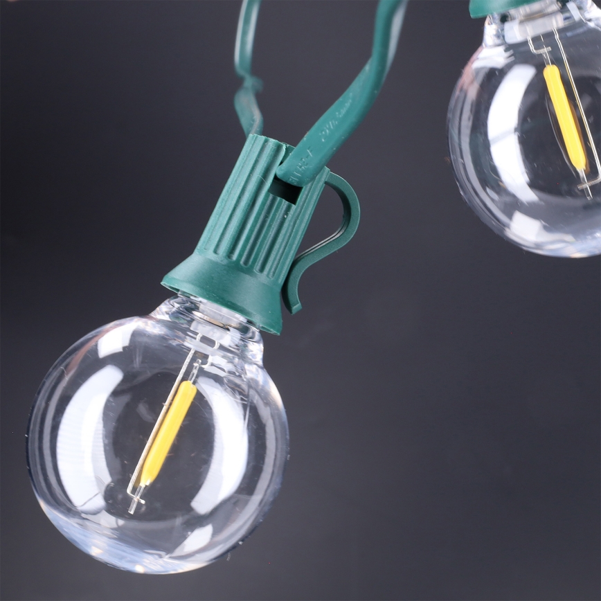 Brilagi - LED Εξωτερική διακοσμητική γιρλάντα GIRLANDA 25xE12/0,8W/230V 20m πράσινη IP44 θερμό λευκό