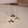 Eglo - Κρεμαστό φωτιστικό οροφής 3xE27/40W/230V μαύρο/χρυσό