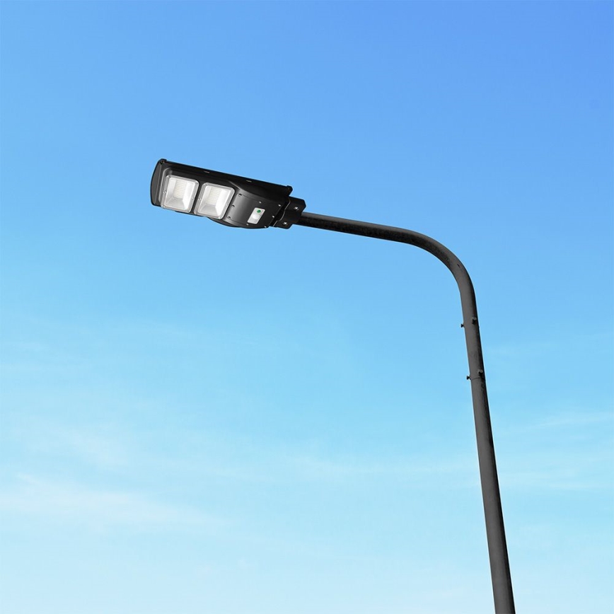 LED Ηλιακό φωτιστικό δρόμου με ρυθμιζόμενη ένταση φωτισμού και αισθητήρα κίνησης και λυκόφωτος LED/8W/3,2V 6000K IP65 9000 mAh μαύρο + τηλεχειριστήριο