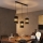 LED κρεμαστό φωτιστικό με καλώδιο BOGART 3xE27/15W/230V μαύρο/χρυσό