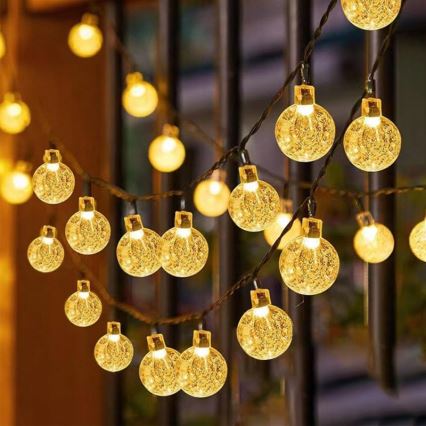 LED ηλιακή διακοσμητική γιρλάντα 50xLED/8 λειτουργίες 500 mAh 9,5 m IP67 ζεστό λευκό