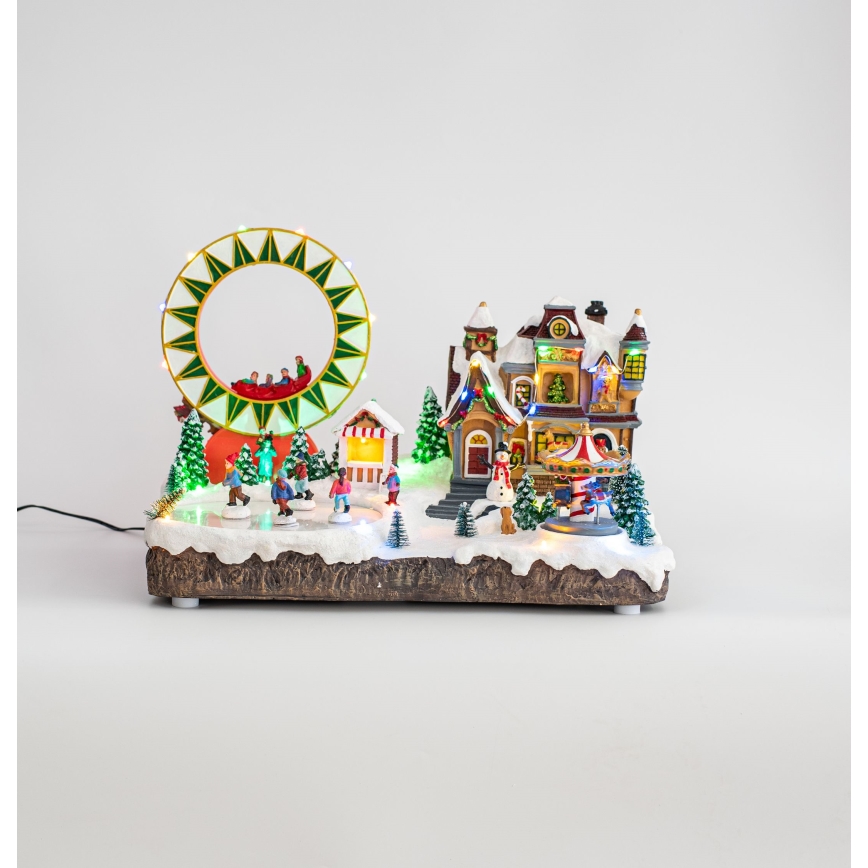 LED RGB Χριστουγεννιάτικο φωτιζόμενο διακοσμητικό με μουσική 30xLED/1,5W/230V χιονισμένο χωριό