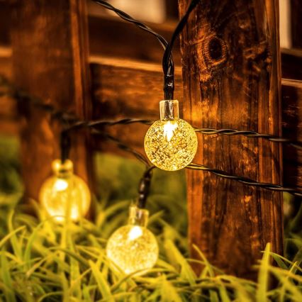 Ηλιακή διακοσμητική γιρλάντα LED 30xLED/8 λειτουργίες 500 mAh 6,5 m IP67 θερμό λευκό