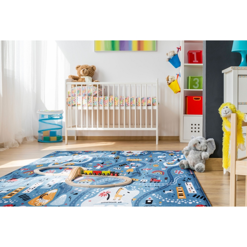 Παιδικό χαλί STELLA STREETS 100x150 cm — μπλε με σχέδιο πόλης