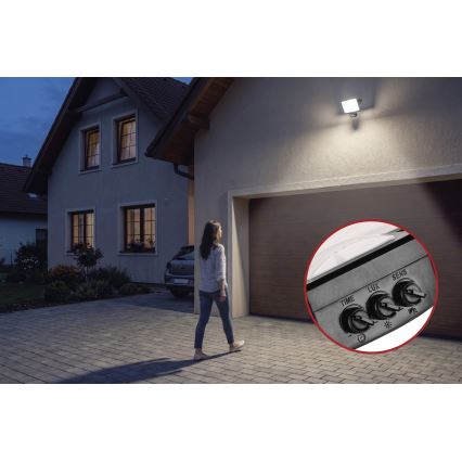 LED προβολέας με αισθητήρα κίνησης και λυκόφωτος TAMBO EVO LED/30W/230V 4000K IP44 μαύρο