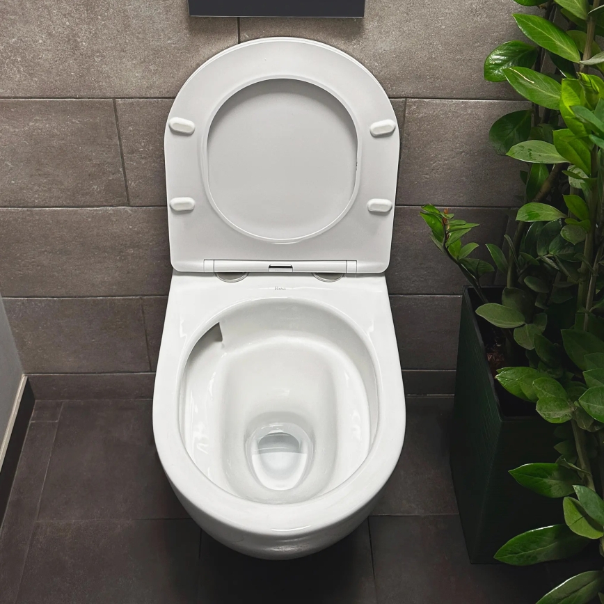 REA-C1259 - Κρεμαστή λεκάνη WC με κάθισμα CARLO MINI TORNADO RIMLESS, κεραμική/γυαλιστερό λευκό