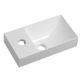Sapho - Επιτοίχιος νιπτήρας PICCOLINO 31x17 cm αριστερός/χυτό μάρμαρο/λευκό